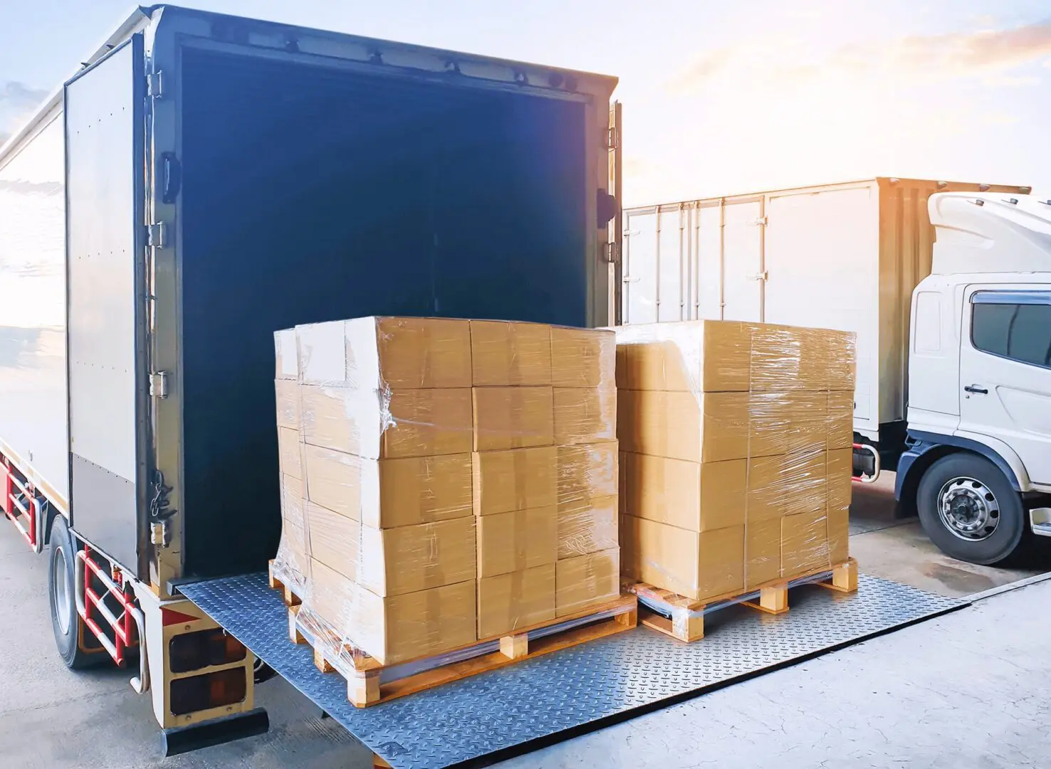 Loading pallets onto a delivery truck.